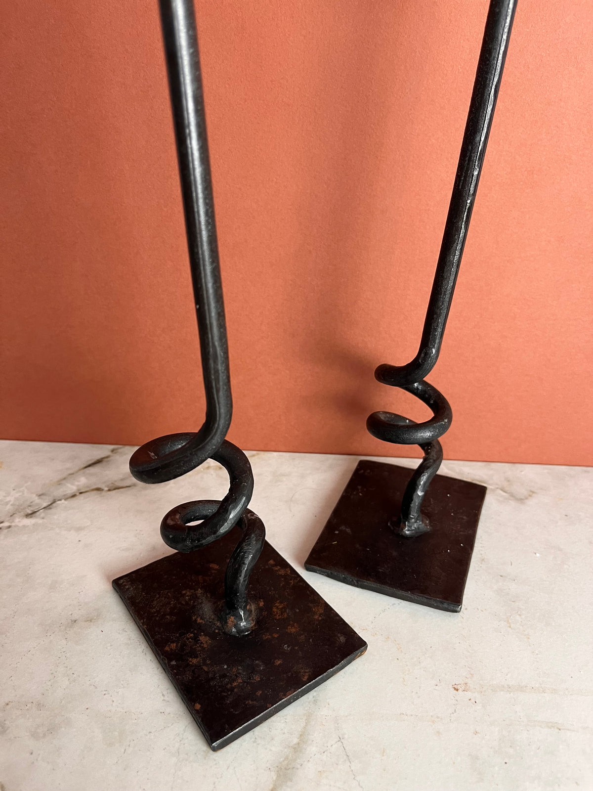 A PAIR OF TWISTED CANDLE HOLDERS