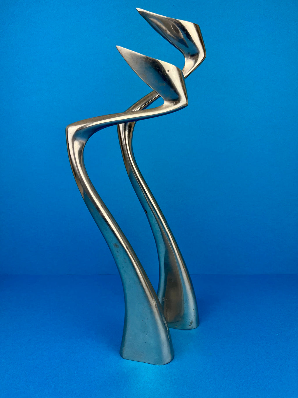 PAIR OF MATTHEW HILTON 'SWAN' CANDLE HOLDERS