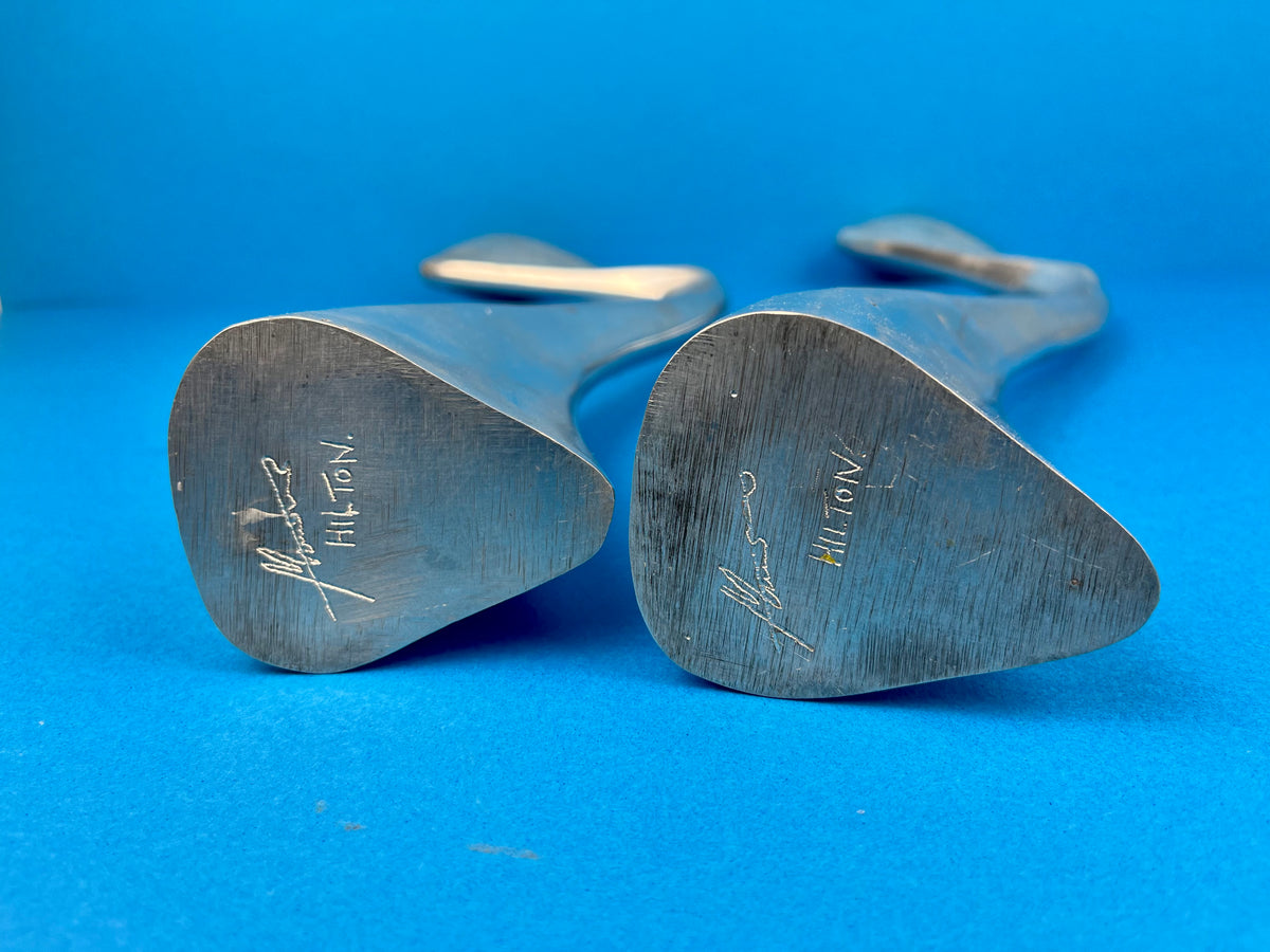 PAIR OF MATTHEW HILTON 'SWAN' CANDLE HOLDERS