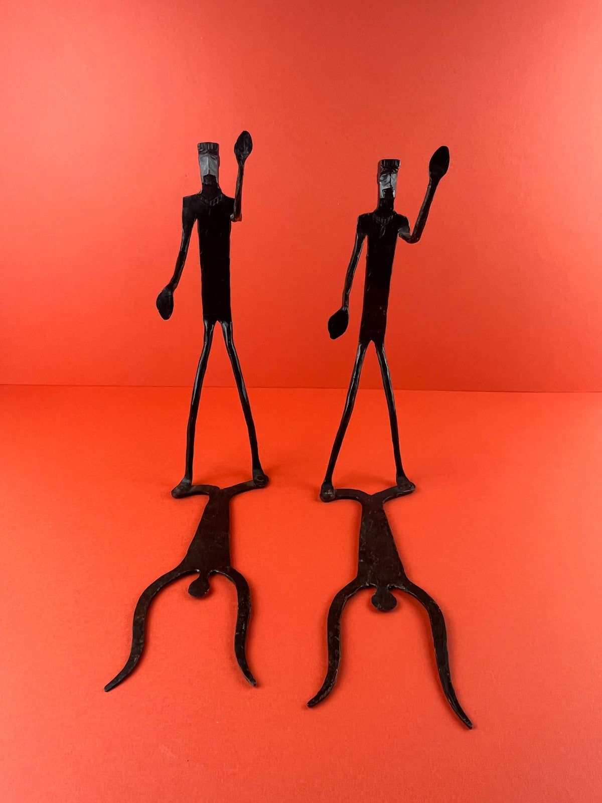WROUGHT IRON DOGON FIGURAL BOOKENDS