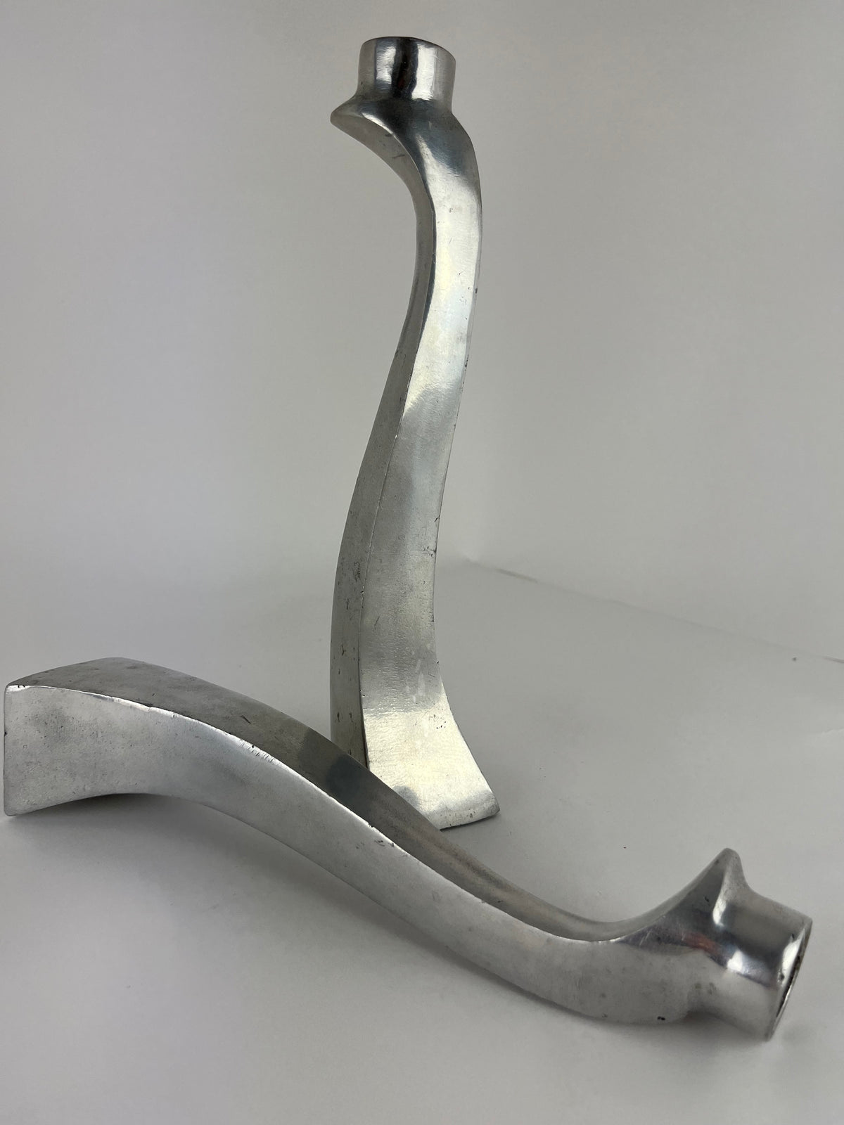 PAIR OF ALUMINIUM CANDLE HOLDERS