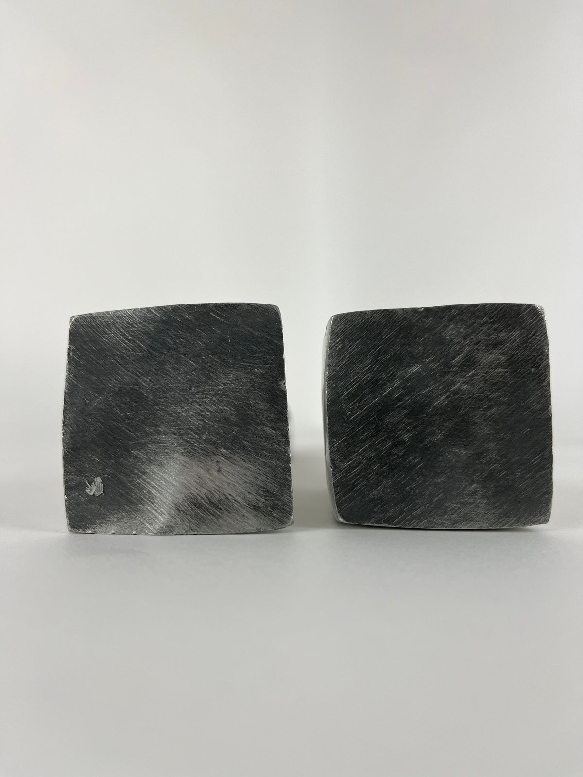 PAIR OF ALUMINIUM CANDLE HOLDERS