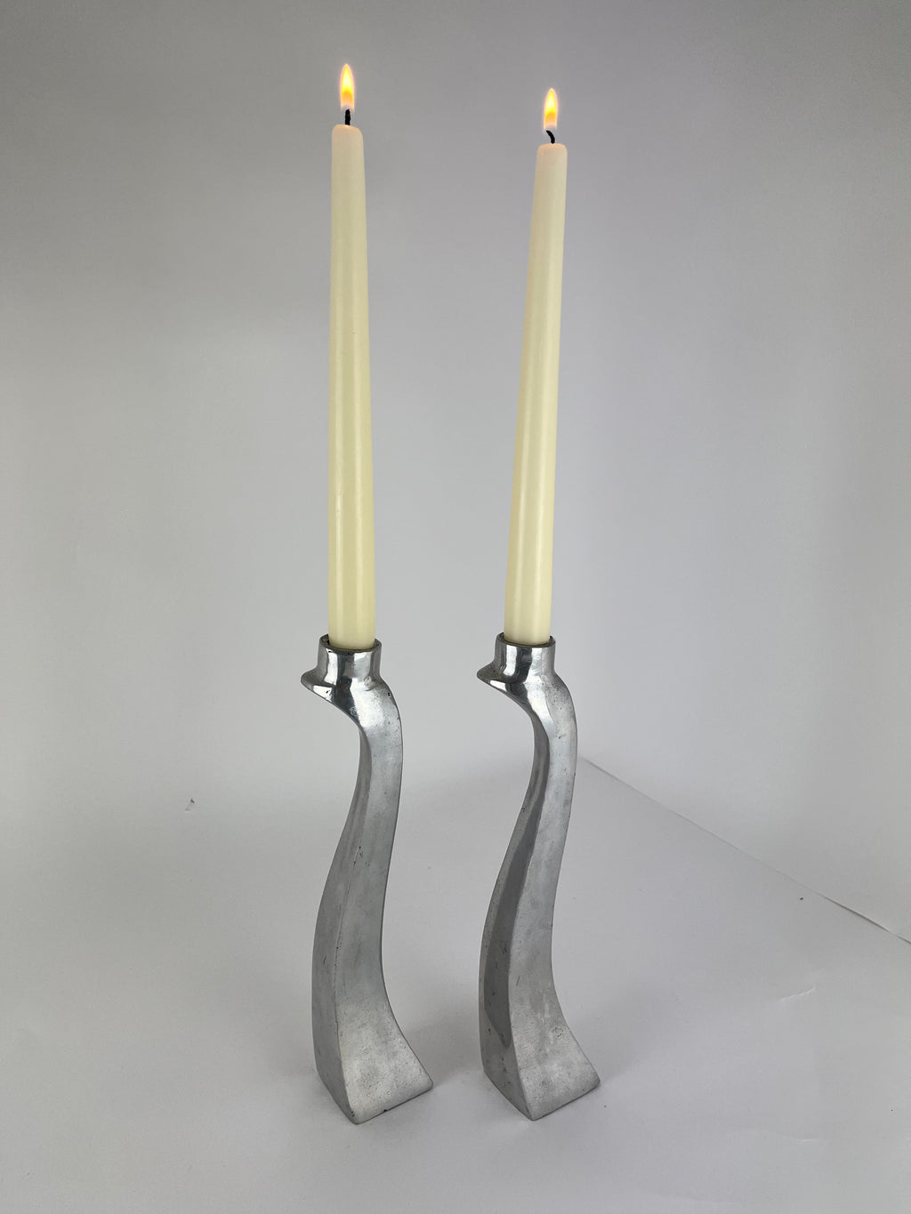 PAIR OF ALUMINIUM CANDLE HOLDERS