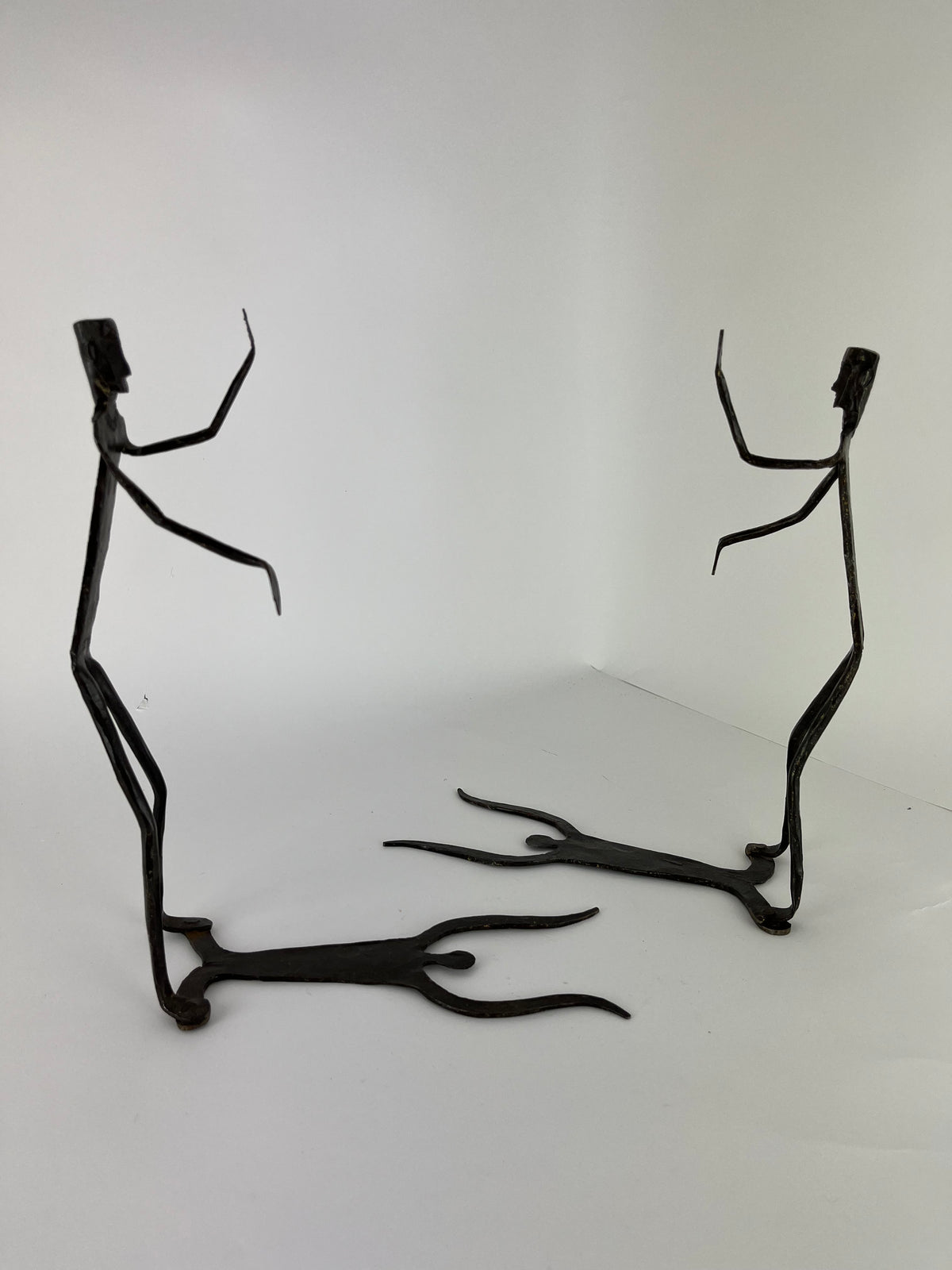 WROUGHT IRON DOGON FIGURAL BOOKENDS