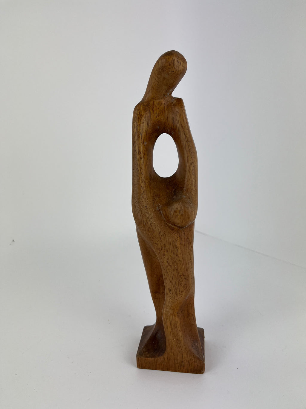 CARVED PARENT AND CHILD WOODEN SCULPTURE