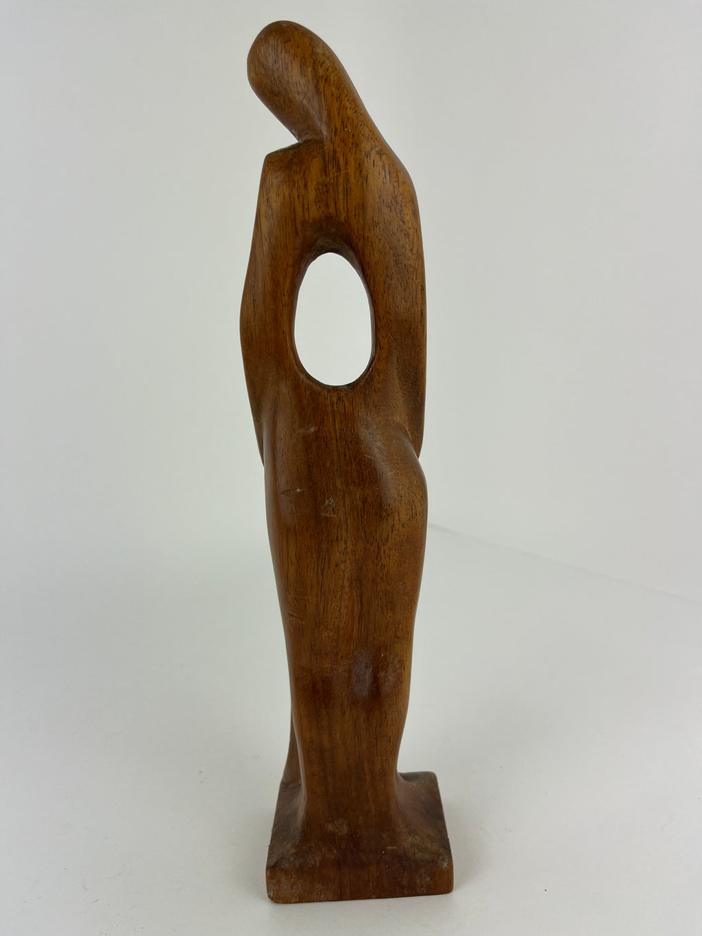 CARVED PARENT AND CHILD WOODEN SCULPTURE