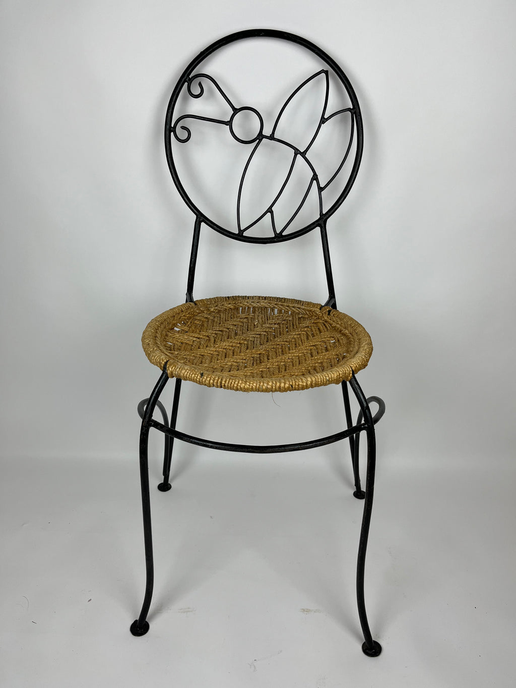 A PAIR OF WROUGHT IRON 'BUTTERFLY' DESIGN CHAIRS