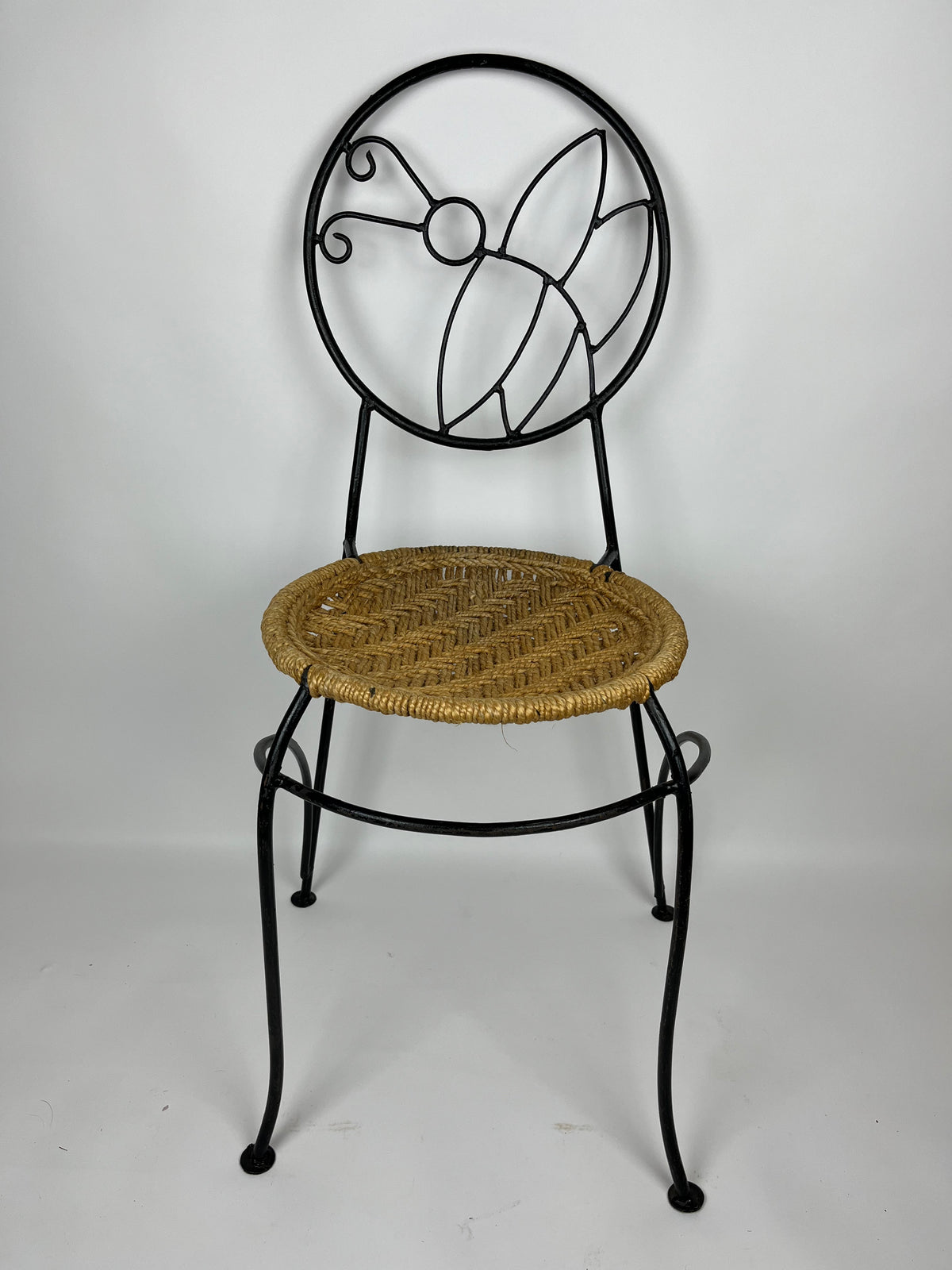 A PAIR OF WROUGHT IRON 'BUTTERFLY' DESIGN CHAIRS