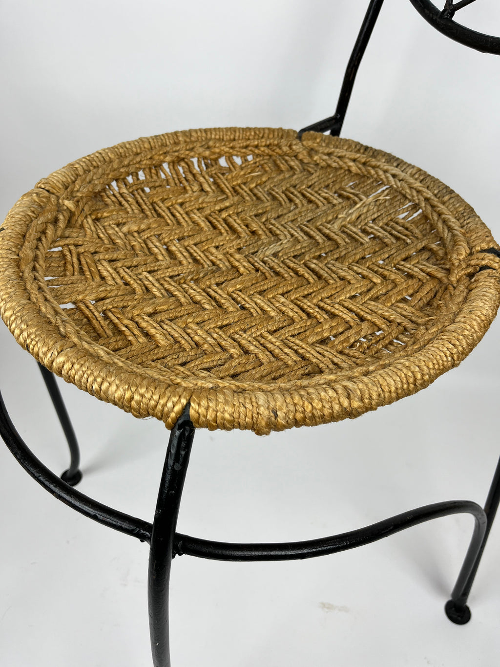 A PAIR OF WROUGHT IRON 'BUTTERFLY' DESIGN CHAIRS